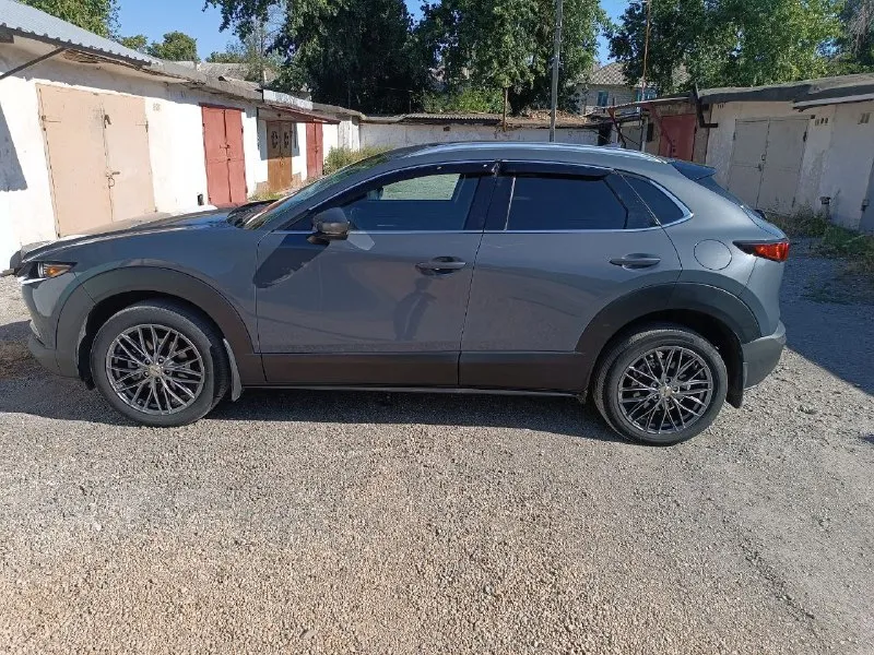Mazda cx-30 awd 2.5 2020 год полный привод. состояние нового авто! пробег 60 тыс, на 55 тыс сделано большое то. замена масел везде (коробка, приводы) двигатель надежный 189 сил, коробка aisin обычный автомат. комплектация: - led оптика - авто дальний - камера заднего вида - адаптивный круиз - car play, - удержание в полосе, - мертвые зоны, - двух зонный климат, - бесключевой доступ, - музыка bose - люк - очень красивый цвет владею авто 4 года, не избавляюсь, машина в отличном состоянии, ночевала всегда в гараже, бережная эксплуатация. зимняя резина с дисками в отличном состоянии в комплекте идёт! вся безопасность на месте, любые проверки. цена 2 550 000 руб, торг +7 949 303 2834 📞 звоните: +7(949)3032834 - фотография - 9