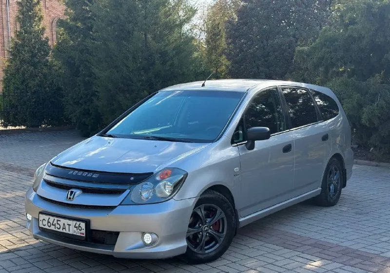 🔥 цена - 550,000 рублей 🔥 продам honda stream (1) рестайлинг, 2004 г. в, отличный 6-и (а заменив 2-й ряд раздельных сидений, получается 7-и) местный “минивэн“. двигатель 1.7 л (бензин) на 125 л. с, обслужен, установлен новый комплект грм, новая помпа. кузов преимущественно в заводском окрасе. пороги переварены в июле-месяце сего года. оригинальный птс, зелёный отчёт по автотеке. обмена нет. находится в г макеевка. контакты : +7(949)4531233 +7(951)7679727 - фотография - 2