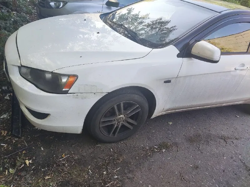 Лансер 10. 2008 г. в. 1.5 л, бензин. приложить руку есть к чему. ездит каждый день. цена 500 т. р. т... - фотография