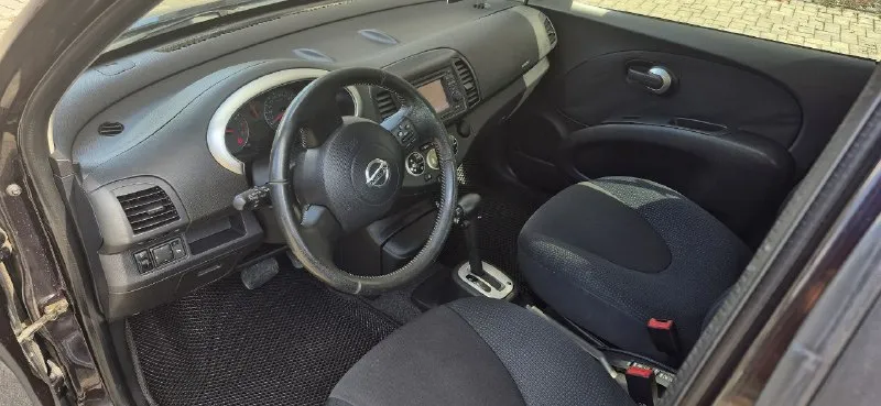 Nissan micra 2010г мотор 1.4 + акпп. пробег 115т. км официальный автомобиль, покупался в донецке у дилера " алекс " максимальная комплектация- без ключевой доступ, датчик дождя + света, подогревы сидений, противотуманные фары, климат контроль, сенсорная магнитола + usb + навигация. полный комплект документов и ключей с салона. присутствуют мелкие сколы и царапины, машина не новая. технических проблем нет. продажа с переоформлением. осмотр в донецке цена 630т. р +79497031476 - фотография - 5