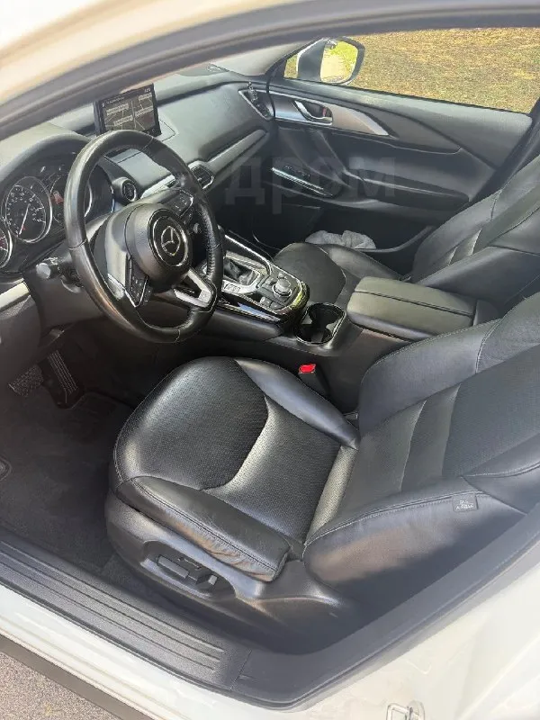 Mazda cx-9 2020 цена 3.3 млн руб. двигатель бензин, 2.5 л мощность 231 л. с., налог коробка передач привод 4wd цвет белый пробег 73 000 км поколение 2 комплектация 2.5t at exclusive отличное состояние, масло менял каждые 7000км, расходники менялись по регламенту, любые проверки на сто, юридически чистый. автомобиль с америки пригонял для себя с пробегом в 17000км в 2022 году лнр. учет рф, 1 собственик с 2022 года. в 2025г поставил на учет рф, никаких доп платежей(утиль сбор и т. д.) не нужно делать. оформление в мрэо без проблем. два ключа, сигнализация starlaine gps 2 сим-карты. комплект зимней резины, второй комплект ковриков в подарок. срочно!реальному покупателю торг! +7 959 133-93-93 денис (луганск) 📞 звоните: +7(959)1339393 - фотография - 7