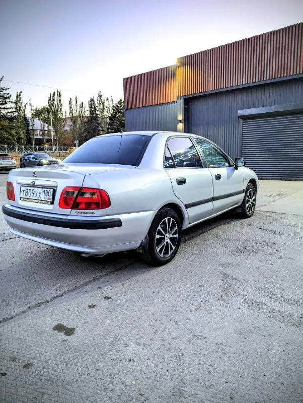 Mitsubishi carisma, 1,6л. 16v рест цена: 275 тыс. р. осмотр: г донецк, калининский район описание: 2002г. в., рестайлинг, двигатель 1,6л (103л. с.) 16v, пробег 207т. км. , коробка механика, гур, 4эсп+ доводчики, подогрев пер. сидений, электро рег зеркал, противотуманки, кондиционер (работает), abs, airbag (srs) водитель+пассажир, бортовой компьютер, цз+ сигнализация, 2ключа. состояние: двигатель, коробка - без нареканий, ходовка - свежая (недавно перебрана), кузов: дно, пороги, арки и т. д.- без гнили и рыжиков. машина обслужена (использовалась для дальних поездок). просторный, опрятный салон, вместительный багажник. ❗️переоформление в мрэо обязательно❗️ ❗️искатели идеала и торгаши - мимо, цена как за ланос❗️ все вопросы по телефону или при встрече +79496415133 📞 звоните: +7(949)6415133 - фотография - 2