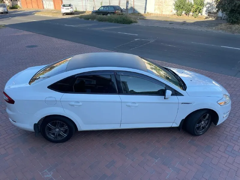 Продам автомобиль представительского бизнес класса ford mondeo 4 год выпуска конец 2012, куплен в феврале 2013 у официального дилера. двигатель: 1.6(160л. с) коробка: механика пробег родной 147.000км я единственный хозяин. двигатель, коробка и подвеска в отличном состоянии! технически автомобиль полностью обслужен. вложений никаких не требует. сел и поехал. стёкла все родные включая лобовое. кузов в хорошем состоянии (обработаны антикором днище, арки и скрытые полости). по городу расход 8 литров, по трассе 6.5л на 100км. климат контроль двухзонный. управление на руле, парктроники. abs, esp электро регулировка сидений. подушки безопасности. запуск start stop. круиз контроль. лобовое стекло с подогревом. 4 автоматических стеклоподъемника с защитой от придавливания. сигнализация starline с автозапуском. противоугонный замок на кпп construct. новое запасное колесо. в бронепленке:фары, на дверях, пороги. два комплекта резины на оригинальных дисках. два ключа, сервисная кн 📞 звоните: +7(949)8000907 - фотография - 5