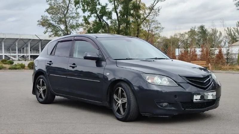 Mazda 3 1.6 2006 год пробег: 208 тыс. км. цена: 465.000 рублей продам мазду 3 на автомате по цене гранты. надежный, крепкий автомобиль, техническая часть в порядке, состояние сел - поехал. автомобиль хорошо укомплектован, климат-контроль, андроид мультимедиа, линзованная оптика, легкосплавные диски и свежая резина. осмотр: донецк, район южного ав 📞 +79496317985 📞 звоните: +7(949)6317985 - фотография - 2