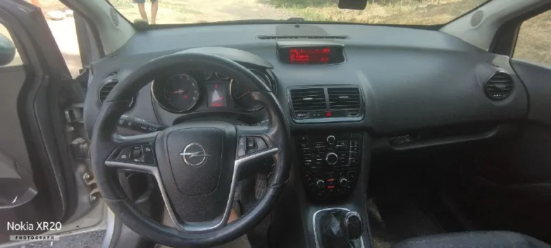 Продам опель мерива б,2012 год, двигатель 1.4,цепь, в отличном состоянии, обслуживался у официалов, пробег родной трасса, есть всё для комфортной езды, кондиционер, круиз, подогрев сидений, зеркал, руля, двигатель в отличном состоянии, не дымит, не троит, масло не ест, коробка работает ни чего не хрустит, не вылетает, ходовка на отлично, ни стуков не грюков! сигнализация с автозапуском!715000 торг у капота!звонить по тел. +79495619284 - фотография - 7