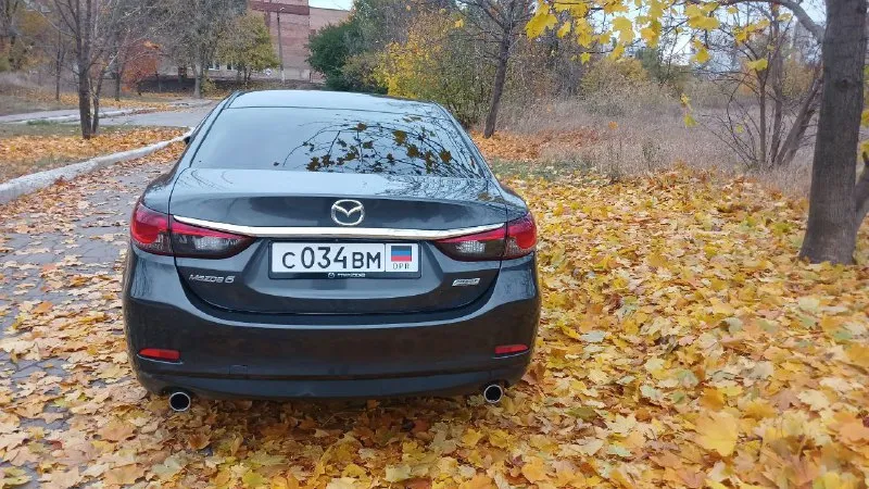 Продаётся личный автомобиль mazda 6 2012г. (по стс, в эксплуатации с 2014г. ) 2,5 (192 л. с. ) skyactiv коробка автомат пробег 129.000 мл. американка, были минимальные повреждения. комплектация: двухзонный климат, круиз, старт/стоп, безключевой доступ, камера заднего вида, мультируль, музыка bose и многое. ⚙масло менялось каждые 6т. км. (расходники на оригинал) резина новая, в комплекте также зимняя. пробег оригинал, любые проверки. vin по запросу. при покупке будете первым владельцем на учете рф🇷🇺 машинка просто🔥 цена 1 470 000 (торг реальному покупателю). +79493026441 +79493492340 📞 звоните: +7(949)3026441 - фотография - 2