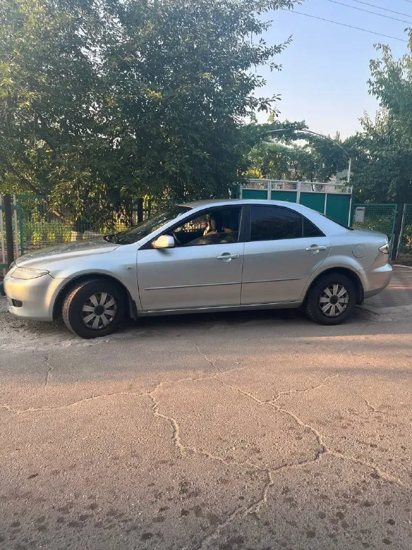 Продает авто mazda 6, год выпуска 2004, в хорошем рабочем состоянии, цвет серый, двигатель 1.8, седа... - фотография