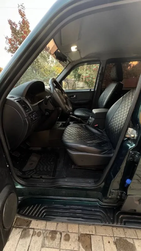 Уаз патриот год: 2015 пробег: 85.000 дополнительная информация: мотор 409 2.7/128лс. 5мкпп. технически и косметически в отличном состоянии. без коррозии и аварий, автомобиль обработан, хорошая грязевая резина, мультимедиа. фактически один владелец, салон как новый, всегда в чехлах. машина в отличном состоянии, ничего обслуживать и делать не нужно. зеленая автотека, оформлена на меня, без аварий. осмотр донецк, калининский цена: 690 т. руб. торг +7(949)77-101-77 - фотография - 9