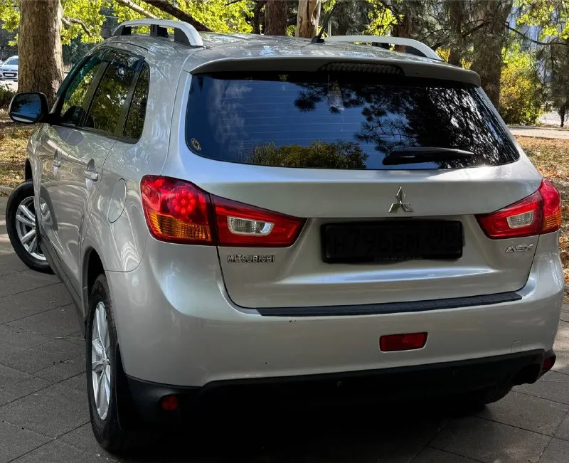Продам mitsubishi asx год:2013 пробег :132.000 двигатель:1.6 коробка :механика автотека зелёная без дтп в родном окрасе автомобиль в идеальном состоянии за машину не стыдно полностью обслужен от а до я ходовая работает идеально без посторонних звуков 3.500км назад было полное обслуживание за машину не стыдно готов на любые проверки за ваш счет комплектация:, подогрев стекол, мульти руль, круиз контроль, подогрев сидений, кондиционер рабочий, bluetooth, в машине есть все для удобства цена: 1.080.000 +79495278015 - фотография - 3