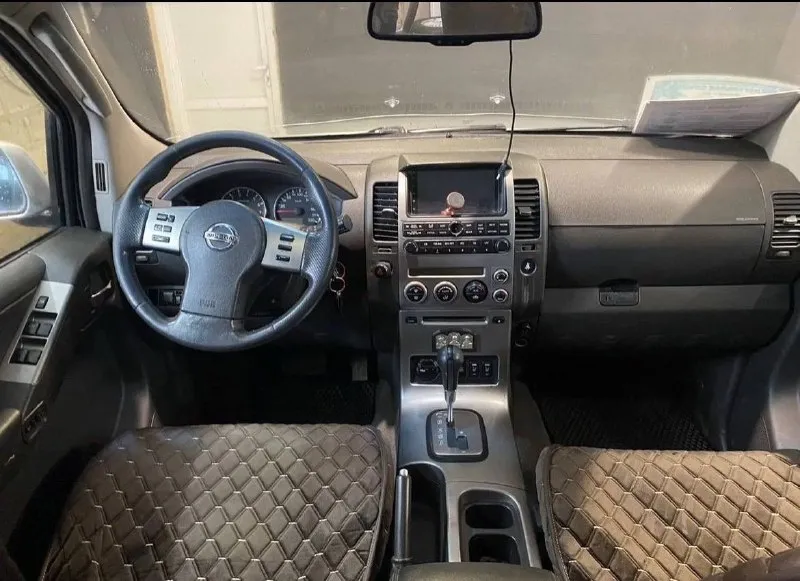 Продаётся мощный и надёжный nissan pathfinder 2006 года с бензиновым мотором 4.0 л — отличный вариант для тех, кто ценит комфорт и уверенность на дороге. ✅ полный привод – настоящая проходимость ✅ просторный салон – удобно для семьи и дальних поездок ✅ технически исправен, вложений не требует ✅ косметические мелочи присутствуют, но на них сделаю адекватную скидку пробег: 275 000 км цена: 900 000 руб. авто в донецке. поставил недавно контрактный мотор с гарантией. возможен обмен на toyota с продажей не спешу номер для связи +7 949 484 0684 📞 звоните: +7(949)4840684 - фотография - 9