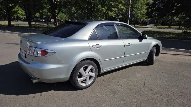 Продаю mazda 6 gg 2003 года пробег: 205 000 км двигатель: 2.0, бензин коробка передач: механика состояние: хорошее технически и внешне в хорошем состоянии, фото соответствуют реальности. кузов: полностью в заводском окрасе комплектация: кондиционер электростеклоподъёмники 4 мульти-руль подушки безопасности abs dsc круиз-контроль цена: 500 тыс. ₽, аргументированный торг у капота! осмотр: донецк телефон: +79493485704 - фотография - 6