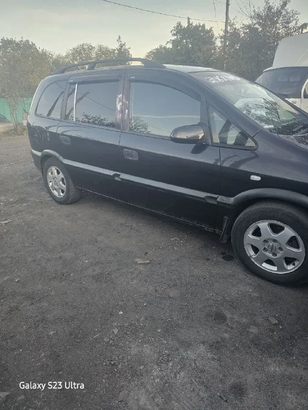 Продам opel зафира 7 мест, 2000г. в хорошем состоянии, кузов без рыжиков, мотор и кпп все работает исправно, полное переоформление, цена 480т. +79494615295 снежное. 📞 звоните: +7(949)4615295 - фотография - 5