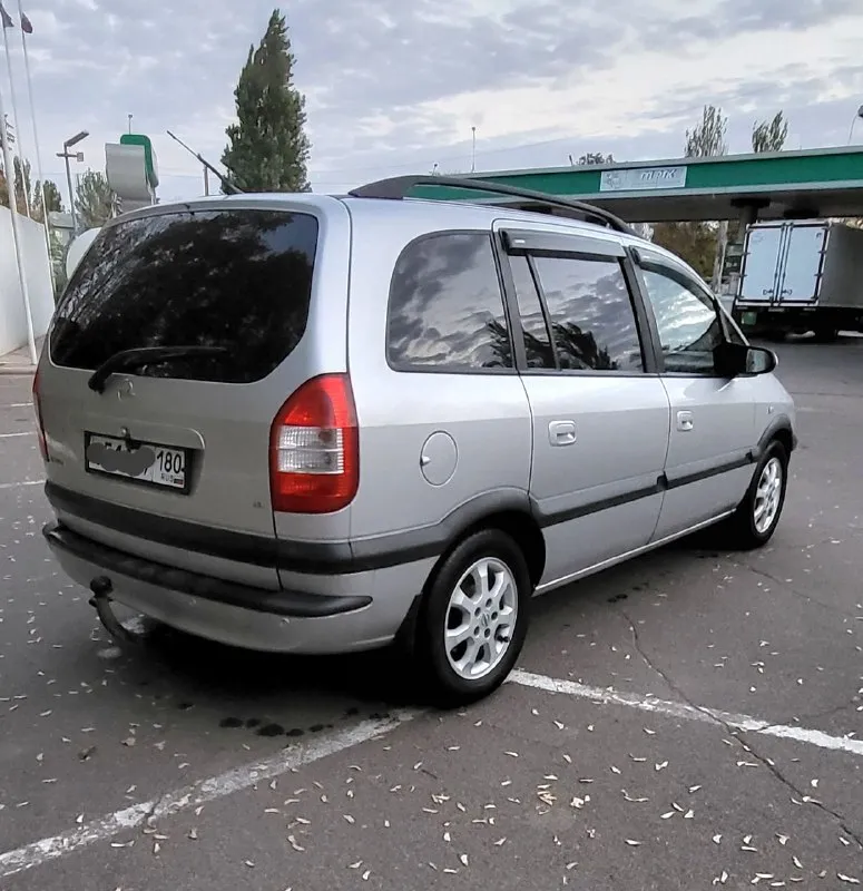 Opel зафира opel zafira 1.6 16v рестайлинг 2004 г. в. превосходное состояние авто. пригнана в 2018 году в донецк, один собственник. родной пробег, вся история обслуживания. установлено пропан. не бит, корозии нет. стекла атермальные родные. хорошая комплектация: 10 airbag, климат контроль, круиз контроль, птф, полный бортовой компьютер итд. все работает. 2 ключа. донецк. плохая связь. 620т. р. +79498049797 📞 звоните: +7(949)8049797 - фотография - 2