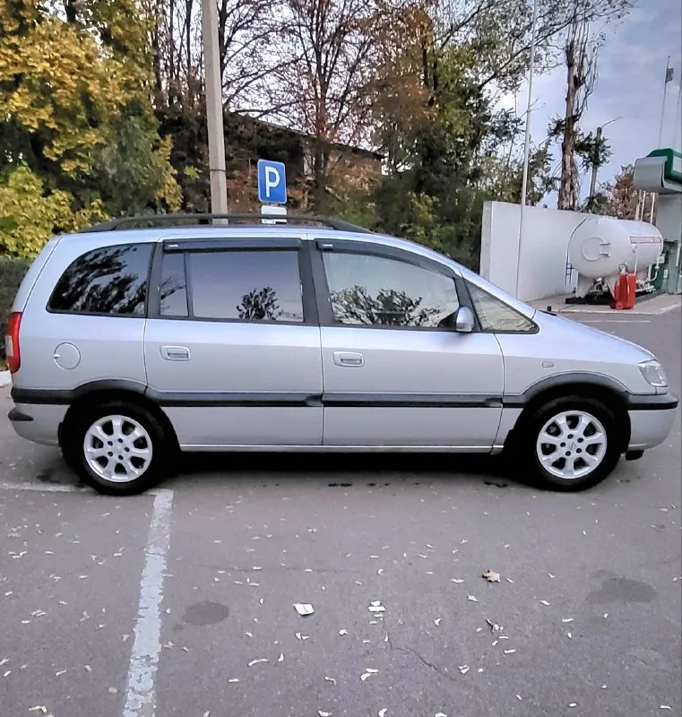 Opel зафира opel zafira 1.6 16v рестайлинг 2004 г. в. превосходное состояние авто. пригнана в 2018 году в донецк, один собственник. родной пробег, вся история обслуживания. установлено пропан. не бит, корозии нет. стекла атермальные родные. хорошая комплектация: 10 airbag, климат контроль, круиз контроль, птф, полный бортовой компьютер итд. все работает. 2 ключа. донецк. плохая связь. 620т. р. +79498049797 📞 звоните: +7(949)8049797 - фотография - 5