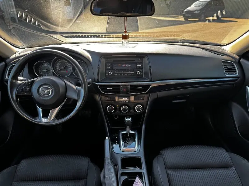 В продаже mazda 6, 2014 года выпуска автомобиль на моторе 2.0 бензин. двигатель работает отлично, не троит и не дымит! коробка автомат, переключает хорошо, без пинков и рывков. ходовая часть обслужена, ничего не стучит и не гремит. автомобиль полностью в родном окрасе! не крашена ни одна деталь! по документам полный порядок, любой вид переоформления. осмотр в донецке цена 1.460.000, возможен торг у авто ☎️ +7 (949) 628-72-17 📞 звоните: +7(949)6287217 - фотография - 5