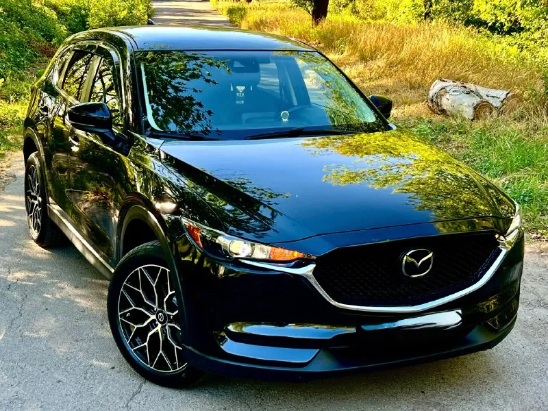 Mazda cx5 2019год двигатель 2.5 skyactive бензин (самый надежный)! родной пробег 63.000 км коробка передач :автомат (обычный aisin)гидротрансформатор! автомобиль в отличном состоянии, двигатель работает отлично, ходовая в отличном состоянии, коробка переключает без пинков, кузов целый без ржавчины и гнили. новая резина летняя 19 колеса, эл зеркала с подогревом, обогрев переднего и заднего стекла, помощь при спуске, круиз, климат, датчики света и дождя, кожаный салон + алькантара, сабвуфер, комплект зимних ковриков и еще много чего. машина полностью обслужена от а и до я !также нанесено керамическое покрытие!!!машина смотрится отлично !расход по городу 10-11литров, едет очень шустро !цвет черный жемчуг!цена 1000000₽ +7949-559-52-87 также возможен обмен! 📞 звоните: +7(949)5595287 - фотография - 6