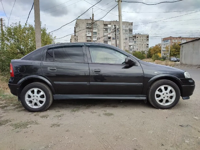 Продам opel astra g 1.6 8-клапанная. год 2001. установлено евро 4. автомобиль в отличном состоянии! все работает исправно. авто без вложений! с документами полный порядок. имеется 2-рой комплект зимней резины на дисках. цена 550 тыс. торг разумный у капота! все интересующие вопросы по телефону: +79493502231 📞 звоните: +7(949)3502231 - фотография - 5
