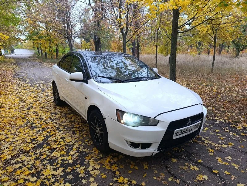 Продам лансер 10 2008 год 1.5 4 эсп подогрев сидений кондиционер лэд свет гур 16 колеса резина зимня... - фотография