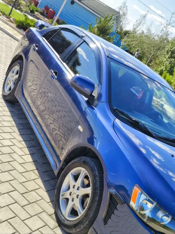 Mitsubishi lancer x год 2008 мотор 1.8 коробка автомат пробег 214.000 комплектация максимальная осмо... - фотография