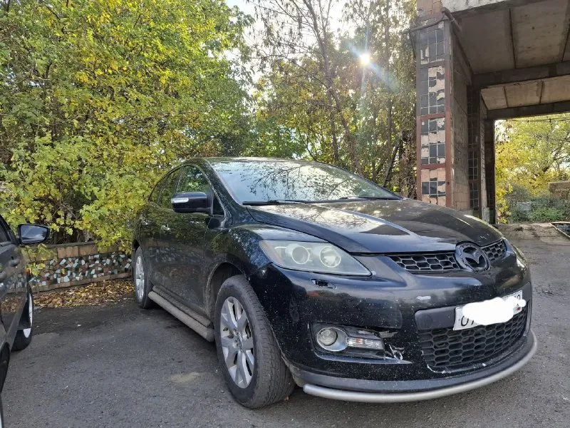 Mazda cx-7 2.3 турбо - год выпуска 2008 - пробег 161.000 в деле каждый день! есть косяки по кузову ! цену вижу за 700 город торез все вопросы по телефону +79495754750 - фотография - 2