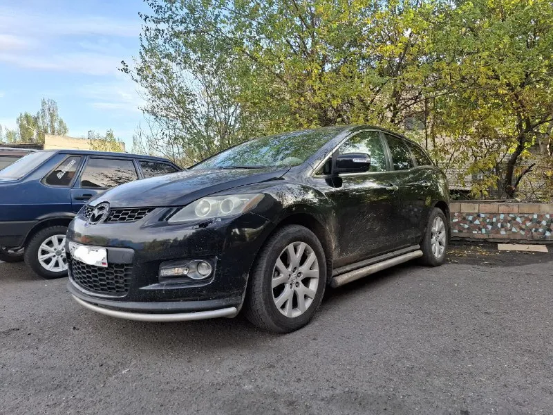 Mazda cx-7 2.3 турбо - год выпуска 2008 - пробег 161.000 в деле каждый день! есть косяки по кузову ! цену вижу за 700 город торез все вопросы по телефону +79495754750 - фотография - 3