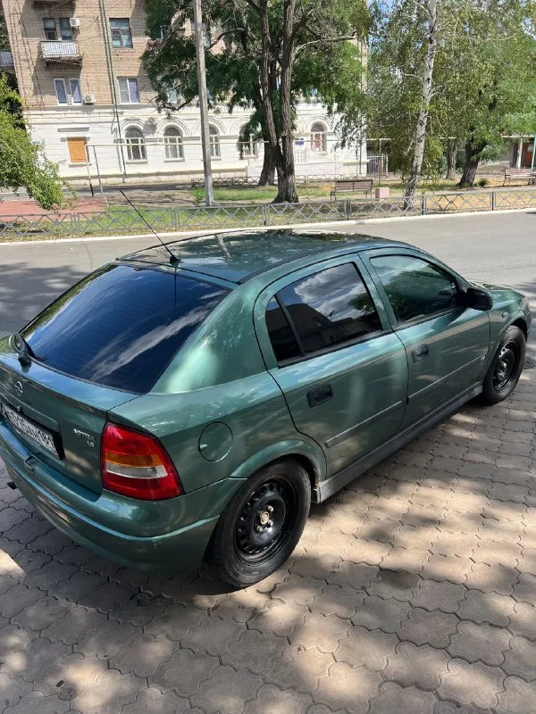 Продам opel астра g 1998 года выпуска 1.6 механика пробег 197 000. цена 350000 тыс торг машина дедушки, во владении более 10 лет. без дтп, в родной краске. ходовая в порядке, ничего не гремит, не стучит, стойки в круг новые. работает ровно. после кап ремонта, фото все есть. новое грм помпа ролики фирма инна. кузов целый, без дыр. гур, абс,4 эл подъемника с доводчиками, люк работает в 2 положениях. все, что должно светиться - работает абсолютно все. машина использовалась раз в неделю и хранилась в гараже. стекла родные, все целые продается в связи со здоровьем. полное переоформление. красный луч +79591402196 📞 звоните: +7(959)1402196 - фотография - 5