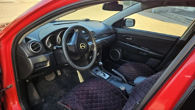 Продам mazda 3, 2007 г. , 1.6 автомат. пробег 210 тыс. , подтвержденный. по технике все хорошо - мотор работает ровно, коробка переключает мягко. по кузову есть жизненные моменты, внутри все работает - климат, эл. стеклоподъмники, подогревы сидений, парктроник. хорошая летняя резина, новый аккумулятор. по документам чистая, стоит на 180 учете - переоформление в мрэо без проблем. цена 460.000 руб, торг возле капота. посмотреть можно в центре донецка +79494522484 📲 tg: erik 📞 звоните: +7(949)4522484 - фотография - 6