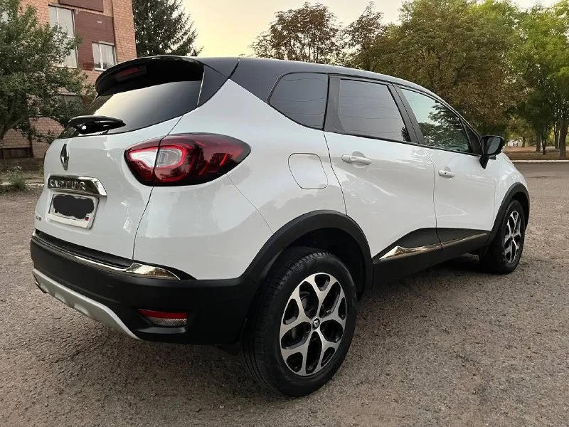 Продается renault kaptur 2018 года выпуска, 1.6 бензин, автомат. автомобиль имеет состояние новой машины!!! 87 тысяч км родного пробега !!! последнее обслуживание - поменяна вся тормозная система ( диски, колодки, суппорта ), новая рулевая рейка !!! бензин только 95-й !!! двигатель работает идеально, замена масла каждые 7 тысяч км !!! комплектация : подогревы сидений, датчики дождя и света, 2 комплекта резины на дисках, 2 ключа, все 4 стеклоподъемники, курсовая устойчивость, круиз-контроль, бортовой компьютер, start-stop, эра-глонасс, электрообогрев зеркал, дневные ходовые огни, сигнализация starline, система помощи при старте, abs, asr, камера заднего вида, мультируль, usb, aux, bluetooth. цена автомобиля 1 млн. 380 тысяч рублей-обоснованный торг у автомобиля !!! возможна продажа в кредит, номер телефона +79591357039, луганск 📞 звоните: +7(959)1357039 - фотография - 4