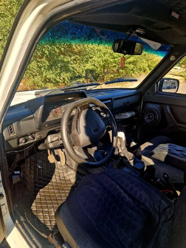 Продам ниву 212140 4×4 2011 год. отличное техническое состояние. инжектор в белом рапторе 500 т. р +79495685510 - фотография - 7