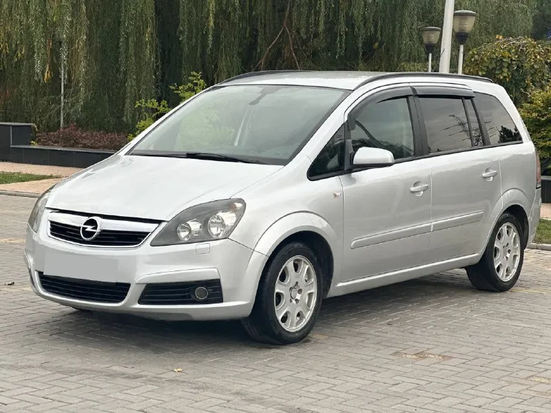 Opel zafira b / opel зафира б объем 1.8 бензин кпп механика пробег 258.000 родной! подтвержденный автотекой автомобиль в отличном техническом состоянии кузов в родной краске ( за исключением пары деталий, косметика) авто без гнили и ржавчины! по двигателю и коробке нареканий нет, все работает исправно. авто без вложений! климат контроль датчик дождя датчик света обогрев передних сидений мульти руль электропривод зеркал обогрев зеркал / заднего стекла сигнализация дополнительные вопросы по телефону г. донецк +79081853560 whatsapp +79595584327 феникс 730.000 торг у капота 📞 звоните: +7(959)5584327 - фотография - 2