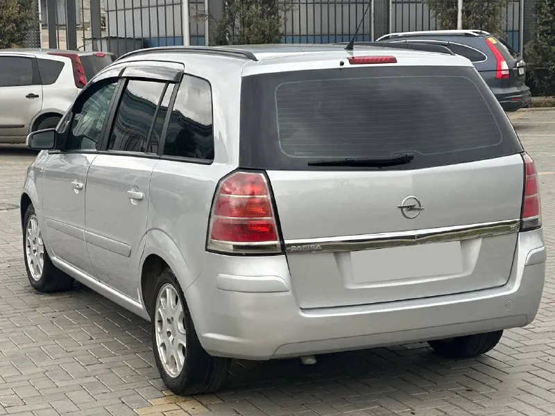 Opel zafira b / opel зафира б объем 1.8 бензин кпп механика пробег 258.000 родной! подтвержденный автотекой автомобиль в отличном техническом состоянии кузов в родной краске ( за исключением пары деталий, косметика) авто без гнили и ржавчины! по двигателю и коробке нареканий нет, все работает исправно. авто без вложений! климат контроль датчик дождя датчик света обогрев передних сидений мульти руль электропривод зеркал обогрев зеркал / заднего стекла сигнализация дополнительные вопросы по телефону г. донецк +79081853560 whatsapp +79595584327 феникс 730.000 торг у капота 📞 звоните: +7(959)5584327 - фотография - 3