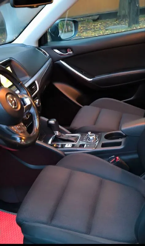 В продажа mazda cx-5 2017 года выпуска двигатель 2.0 бензин коробка автомат пробег.197тыс. км. автомобиль в идеальном состоянии, автотека зелёная абсолютно не какого вложения не требует ! двигатель работает как часики, коробка переключает мягко, плавно, без пенков и прочего, ходовая без посторонних звуков чистый и ухоженный салон, готов на любые проверки с вашей стороны ! есть все для комфортного вождения, двух зонный климат датчик света, и дождя, подогревы сидений мульти руль круиз-контроль, бортовой компьютер, камера заднего вида, адаптивные фары(поворачивают в сторону руля) спорт режим, электро -ручник, aux, bluetooth авто запуск и т. д. с документами все в порядке, продажа с полным переоформлением в мрэо 💯 г. донецк цена 1.800.₽ звоните остальное по, 📞 +7(949)6164847 📞 +7(949)6164847 📞 +7(949)6164847 📞 +7(949)6164847 📞 +7(949)6164847 📞 звоните: +7(949)6164847 - фотография - 7