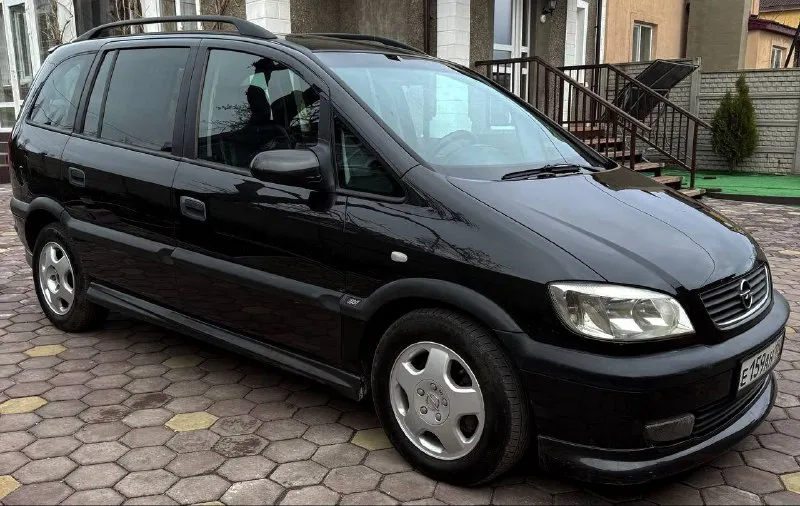 Продам opel zafira 2001 г. в. 📍 город: донецк 🔧 двигатель: 2.2 бензин + газ ⚙️ коробка: механика 💰 цена: 600000руб - торг 🚗 надёжный и вместительный минивэн — отличный вариант для семьи или дальних поездок. семиместная комплектация! ✅ плюсы: двигатель работает отлично, масло не расходует механическая коробка и сцепление в порядке ходовая обслужена, ничего не гремит чистый и аккуратный кожаный салон, люк, подогрев сидений электростеклоподъемники, подушки безопасности, abs летняя резина 🧾 документы в порядке, переоформление без проблем. для связи : +7 949 496 71 76 - никита 📞 звоните: +7(949)4967176 - фотография - 4