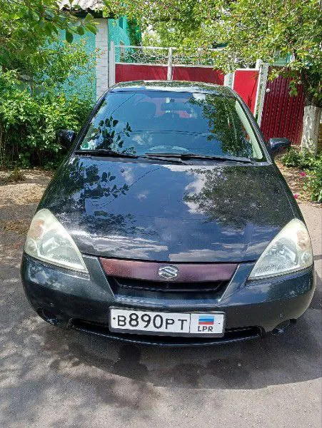 Продаётся семейный городской японский универсал suzuki liana, 2004 года выпуска, 1-е поколение, пере... - фотография