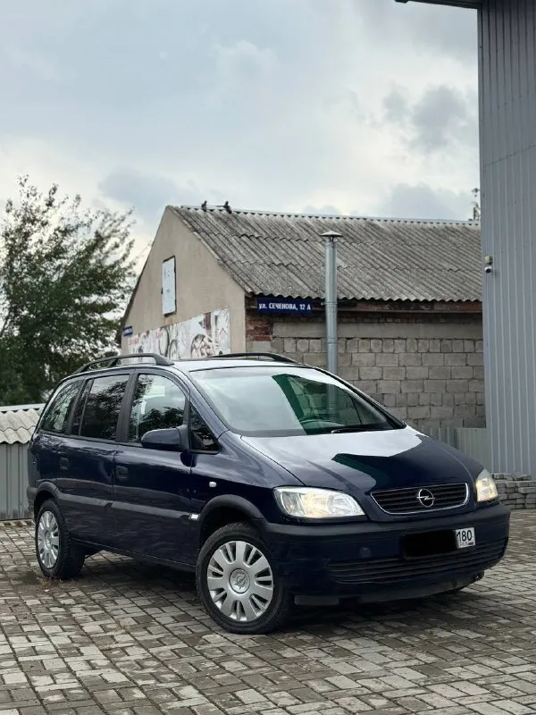 Продам надёжный автомобиль opel zafira 2000 года выпуска 1.8 бензин. работает идеально, не троит и н... - фотография