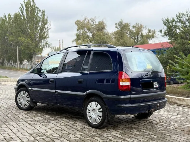 Продам надёжный автомобиль opel zafira 2000 года выпуска 1.8 бензин. работает идеально, не троит и не дымит. коробка обычный автомат aisin! переключает идеально, без пинков и рывков! ходовая вся обслужена! ничего не гремит и не стучит. кузов весь ровный и красивый, практически весь в родном окрасе! по документам полный порядок, любой вид переоформления. машина пригонялась из германии. 7 мест осмотр донецк цена 480.000, возможен торг у авто ☎️ +7 (949) 742-53-98 📞 звоните: +7(949)7425398 - фотография - 6