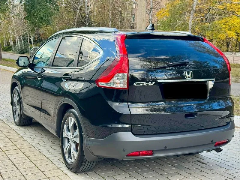 Honda cr-v официал 2013 год выпуска 4wd полный привод двигатель 2.0 бензин коробка автомат пробег 165 тыс. км авто в хорошем состоянии, бережная эксплуатация с 2014 года машина вся в заводском окрасе 1000% готов на любые проверки с вашей стороны ! хорошая комплектация, роздельный климат-контроль, круиз -контроль, датчики света и дождя, подогревы сидений зеркал, многофункциональная магнито android камера заднего вида и т. д. продажа с полным переоформлением в мрэо г. донецк цена 1.625тыс. ₽ звоните остальное по +79494006792 📲 tg: r. b 📞 звоните: +7(949)4006792 - фотография - 2