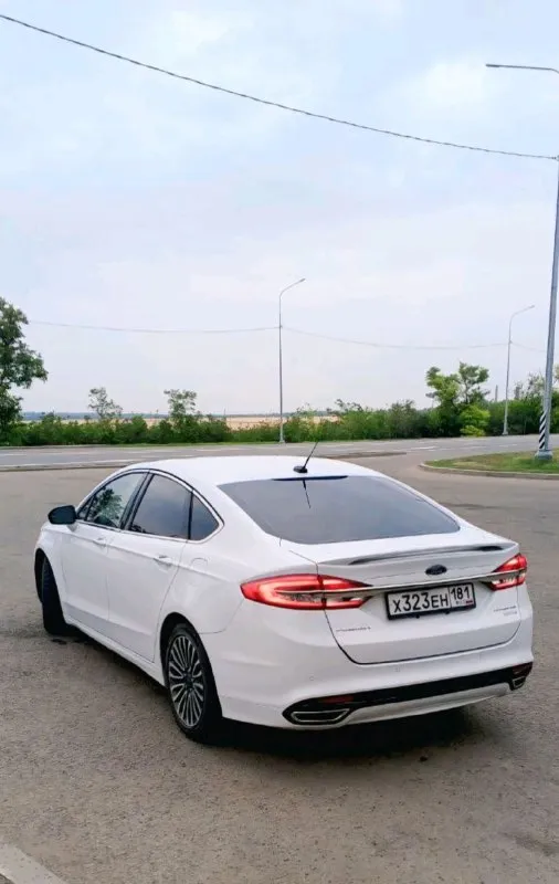 Продам ford fusion 2017 года. 2-х литровый мотор экобуст с турбиной с акпп. комплектация titanium. пробег 106 тыс. км. замена масла каждые 6000-6500 км. лью только liqui moly 5w30. в машине есть все для комфортной езды! - автозапуск с ключа - бесключевой доступ на всех дверях - система стар-стоп - штатная навигация и шикарная музыка - кожаный салон в прекрасном состоянии - акпп шайба и спорт режим -мульти руль - датчик света, оптика супер, дхо - подрулевые лепестки - подсветка салона цвет можно выбрать по вкусу. -электрические передние сидения - память водительского сидения - стеклоподъемники все автоматические - android auto apple carplay - 2-х зонный климат контроль холодит на отлично и подлокотник с охлаждением - круиз контроль - датчик давления в шинах - система удобный доступ в авто - кодовый замок на двери - подогрев сидений машина очень комфортная и динамичная. в комплекте отдам зимнюю резина проехала один сезон. цена 1860000 рублей. торг уместен маши 📞 звоните: +7(959)5360463 - фотография - 2