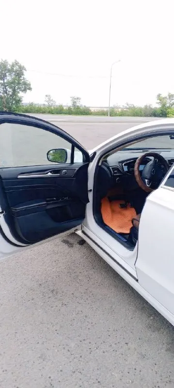 Продам ford fusion 2017 года. 2-х литровый мотор экобуст с турбиной с акпп. комплектация titanium. пробег 106 тыс. км. замена масла каждые 6000-6500 км. лью только liqui moly 5w30. в машине есть все для комфортной езды! - автозапуск с ключа - бесключевой доступ на всех дверях - система стар-стоп - штатная навигация и шикарная музыка - кожаный салон в прекрасном состоянии - акпп шайба и спорт режим -мульти руль - датчик света, оптика супер, дхо - подрулевые лепестки - подсветка салона цвет можно выбрать по вкусу. -электрические передние сидения - память водительского сидения - стеклоподъемники все автоматические - android auto apple carplay - 2-х зонный климат контроль холодит на отлично и подлокотник с охлаждением - круиз контроль - датчик давления в шинах - система удобный доступ в авто - кодовый замок на двери - подогрев сидений машина очень комфортная и динамичная. в комплекте отдам зимнюю резина проехала один сезон. цена 1860000 рублей. торг уместен маши 📞 звоните: +7(959)5360463 - фотография - 5