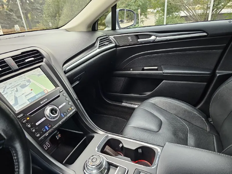 Ford fusion hybrid 2019 titanium (usa) американский mondeo в топовой комплектации! пробег 99 800 км 🔋 гибрид — расход 5–6 л/100 км, на баке до 900 км пробега. 🔧 полностью обслужен, без сюрпризов. 💪надёжный — такие фьюжены в сша проходят 500 000+ км без проблем. ❗первый владелец в рф, подбирал и пригонял под себя. 💎 titanium: адаптивный круиз, удержание в полосе, автоторможение, контроль слепых зон, full led фары, камера, парктроники, кожа, вентиляция и подогрев сидений, подогрев руля, аудио sony, бесключевой доступ, дистанционный запуск, кодовый вход, настраиваемая подсветка, еврозеркала (!) с широким обзором и складыванием. 📌 пробег оригинальный, любая проверка. 💬 без посредников. 📍 осмотр и тест-драйв в донецке 💸 1 890 000 ₽ +79494710689 - фотография - 7
