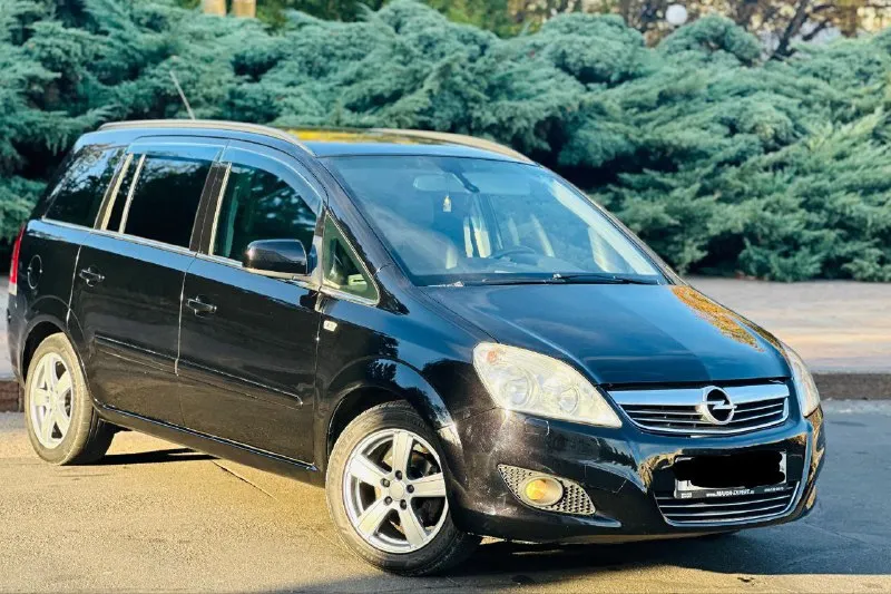 Opel zafira b -год 2010 - 1.8 -кпп механика. -пробег: 243000 родной пробег подтвержденный автотекой! о машине; автомобиль в идеальном состоянии без сколов ржавчин и рыжиков все как на фото! машина без вложений от слова совсем! комплектация:cosmo, 7 мест, кожаный салон, монитор дорогой стоит с камерой заднего вида, омыватели фар, подогрев сидений, авто свет, авто дождь, климат контроль, полный бортовой компьютер! резина r16 два комплекта! цена 880.000 рублей торг реальному покупателю! кому дорого просьба не звонить. звонить по номеру +79490489556 📲 tg: nikolay 📞 звоните: +7(949)0489556 - фотография - 2
