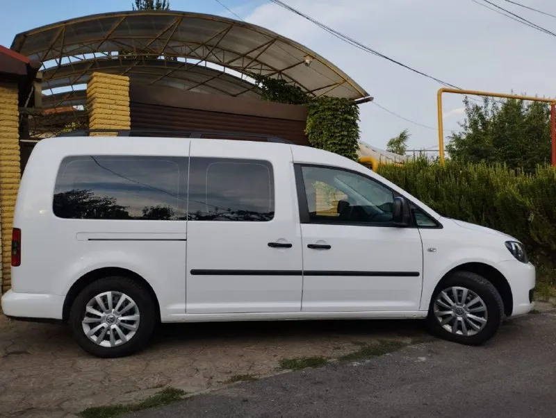 Volkswagen caddy maxi 2014. Заводской пассажир, 7 мест. 2.0,140лс. Мкп-6 ступеней. Два ключа, книжки. Круиз, кондей, родная магнитола с громкой связью, корректор фар, подогрев сидений, контроль прокола колес, заводской фаркоп и др. Пробег 350000. Проверка  на любом сто. 1650000руб. В российских документах будете первым собственником. +79499869505 михаил
📞 Звоните: +7(949)9869505 - фотография - 1