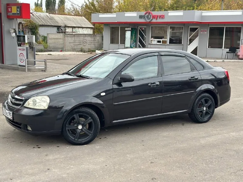 Продам chevrolet лачетти 2012 год 1.4 двигатель состояние как на фото ухоженный автомобиль я собственник тянет очень хорошо ходовая часть на отлично 👍 в машине работает все все жидкости по меняны масло поменяно автомобилем будете довольны едет очень мягко, комфортно коробка втыкается очень плавно и мягко машина без вложений, сел и поехал документы чистые, переоформление в мрео цена 550000тыс. торг на бензин ⛽️ осмотр город макеевка. тел: +79493806656 📞 звоните: +7(949)3806656 - фотография - 2