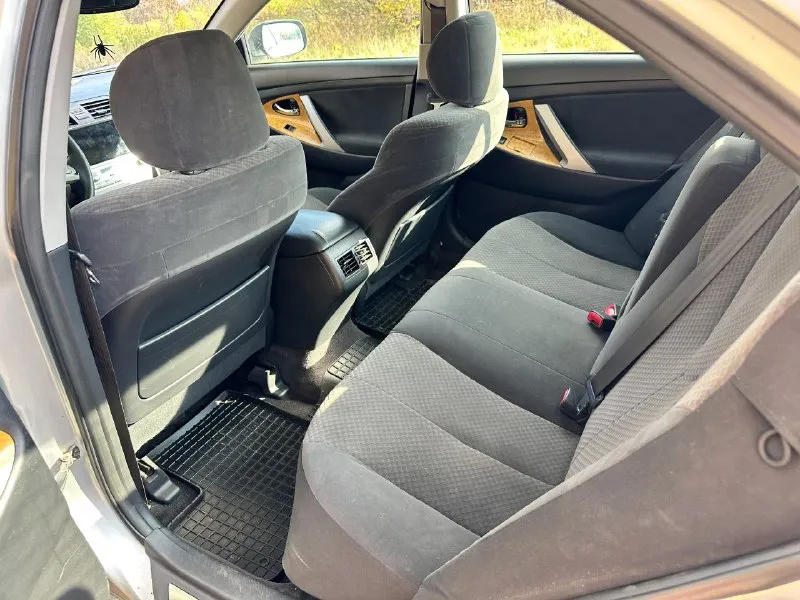 Срочная цена !! toyota camry 2007 мотор 2.4, акпп состояние отличное, мотор работает четко, без нареканий, коробка так же работает отлично, ходовка полностью обслужена, без лишних звуков! комплектация: подогрев седений, зеркал, стекол, складывание зеркал, мультруль, двухзонный климат (заправлен), велюровый салон, отделка деревом, датчик света/дождя, хорошие колонки, дорогостоящая магнитола! а так же установлена линзованная оптика, с двухцветными туманками, свет на 10/10, коррозии нет! машина обслужена и готова к поездкам на любые расстояния, по документам полный порядок !! автотека хорошая! стоимость 835 торг ! машина в донецке, звоните +79494815929 - фотография - 9