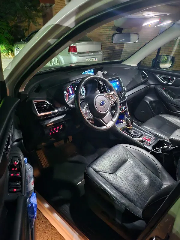 Продаётся subaru forester 2021 года выпуска с двигателем 2.5 цена: 2800000 ₽ год: 2021 пробег: 42000 км двигатель: 2.5 литра (171 л. с.) кпп: линейный вариатор (cvt) привод: полный комплектация: premium состояние: идеальное vin: jf2skauc4mh556737 собственник: 1 владелец (в птс чисто) музыка harman kardon двухзонный климат-контроль. подогрев передних сидений, подогрев руля. камера заднего вида apple carplay и android auto. бесключевой доступ и запуск двигателя кнопкой. расход около 10.2 л/100 км в смешанном цикле. звоните +79493416577 для осмотра, г. макеевка. с удовольствием отвечу на все вопросы! 📞 звоните: +7(949)3416577 - фотография - 7