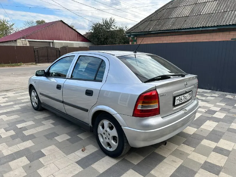 ❗продам opel astra g❗ год выпуска 2000, 1.8 (x18xe самый надежный и без масложора), коробка: автомат пробег: 306.500км (родной) ✅цена: 475.000 руб небольшой торг 📑любой вид переоформления, я вписан в птс. 2 хозяина. vin: wolotgf48y5186466 ♻автомобиль в отличном состоянии. в идеале, масло не берет, работает ровно, тянет хорошо. коробка работает отлично, без пинков и рывков, ходовая вся мягкая и сбитая. ♻комплектация: усилитель руля, стеклоподъемники, кондиционер (заправлен и полностью обслужен), центральный замок, электрорегулировка боковых зеркал, abs, esp, подушки безопасности. 🏠осмотр днр, г. амвросиевка подробности по телефону: +79493060188 (telegram, whatsapp) 📞 звоните: +7(949)3060188 - фотография - 2
