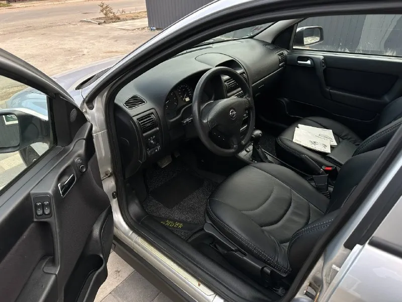 ❗продам opel astra g❗ год выпуска 2000, 1.8 (x18xe самый надежный и без масложора), коробка: автомат пробег: 306.500км (родной) ✅цена: 475.000 руб небольшой торг 📑любой вид переоформления, я вписан в птс. 2 хозяина. vin: wolotgf48y5186466 ♻автомобиль в отличном состоянии. в идеале, масло не берет, работает ровно, тянет хорошо. коробка работает отлично, без пинков и рывков, ходовая вся мягкая и сбитая. ♻комплектация: усилитель руля, стеклоподъемники, кондиционер (заправлен и полностью обслужен), центральный замок, электрорегулировка боковых зеркал, abs, esp, подушки безопасности. 🏠осмотр днр, г. амвросиевка подробности по телефону: +79493060188 (telegram, whatsapp) 📞 звоните: +7(949)3060188 - фотография - 5