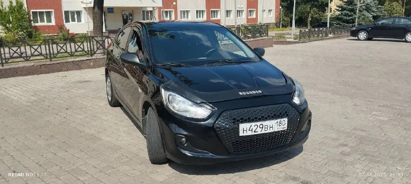 Hyundai solaris 2012г 1,6 механика 186т км. авто в отличном состоянии. 4 стеклоподъёмника, электро зеркала, обогрев зеркал, сидений и лобового стекла. технически состояние хорошее без нюансов. полностью обслужен, новый грм, рабочий кондиционер. прозрачная история, зелёная автотека, в заводском окрасе без дтп, сигнализация, магнитола, камера заднего вида. автомобиль полностью обслужен. сел и поехал. я хозяин. переоформление в любом виде. 850000 руб. торг. автомобиль находится в донецке тел. +79493409187 - фотография - 2