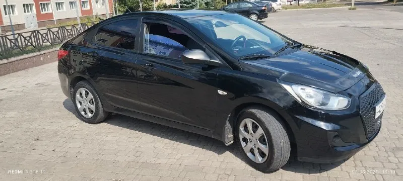 Hyundai solaris 2012г 1,6 механика 186т км. авто в отличном состоянии. 4 стеклоподъёмника, электро зеркала, обогрев зеркал, сидений и лобового стекла. технически состояние хорошее без нюансов. полностью обслужен, новый грм, рабочий кондиционер. прозрачная история, зелёная автотека, в заводском окрасе без дтп, сигнализация, магнитола, камера заднего вида. автомобиль полностью обслужен. сел и поехал. я хозяин. переоформление в любом виде. 850000 руб. торг. автомобиль находится в донецке тел. +79493409187 - фотография - 4