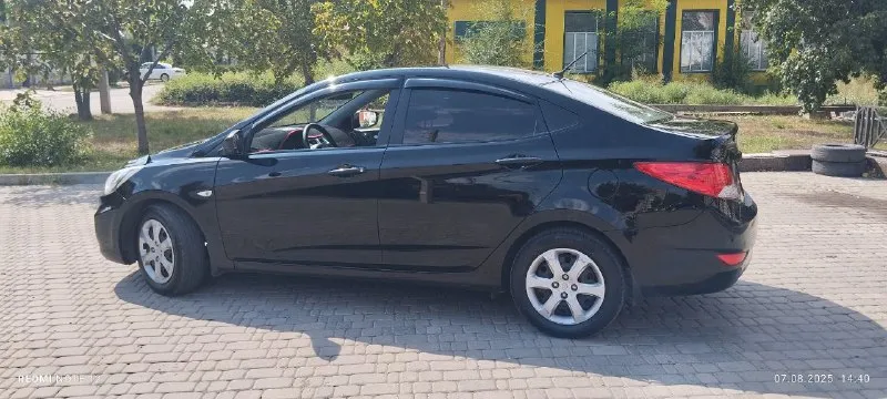 Hyundai solaris 2012г 1,6 механика 186т км. авто в отличном состоянии. 4 стеклоподъёмника, электро зеркала, обогрев зеркал, сидений и лобового стекла. технически состояние хорошее без нюансов. полностью обслужен, новый грм, рабочий кондиционер. прозрачная история, зелёная автотека, в заводском окрасе без дтп, сигнализация, магнитола, камера заднего вида. автомобиль полностью обслужен. сел и поехал. я хозяин. переоформление в любом виде. 850000 руб. торг. автомобиль находится в донецке тел. +79493409187 - фотография - 8